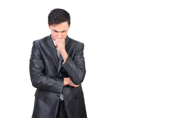 Focused worried man touching chin and thinking