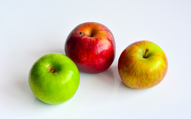 Colorful apples, red green and yellow fruit, isolated on white background.