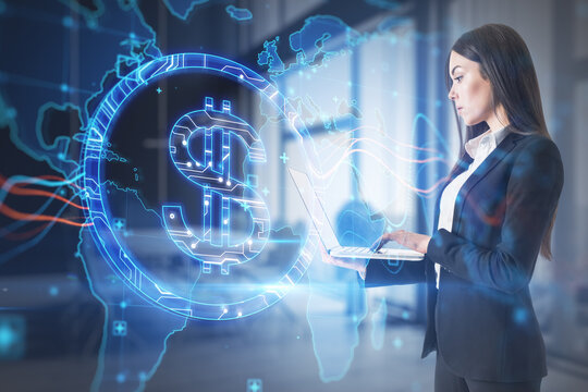 Attractive young european businesswoman using tablet with abstract glowing blue dollar sign and map with charts on blurry office interior background. Currency, trade and digital market concept. 