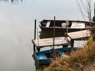 Fototapeta na wymiar some boats on a river called magra near la spezia