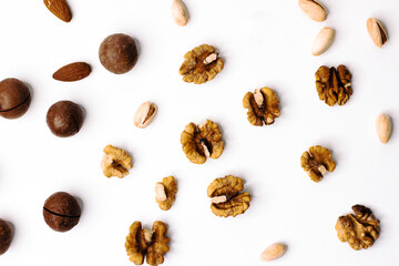 Obraz premium Aesthetic mockups for shop nuts, macadamia, pistachios, almonds, walnuts, spices
