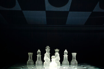Glass chess on glass chessboard	