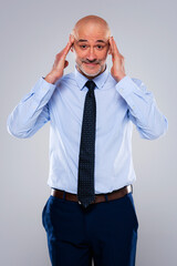 Stressed businessman studio portrait