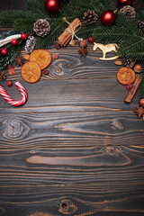 Christmas and New Year holiday frame or border on wooden background