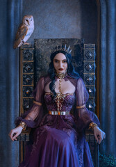 Mythical fantasy woman queen vamp sits on medieval ancient throne. Golden gothic crown on head. Elf girl princess evil face black long hair. Purple vintage art dress. Barn Owl bird symbol wisdom © kharchenkoirina