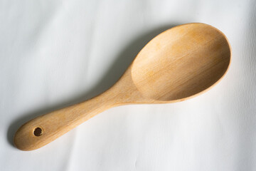 Spoon wood on white background.