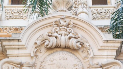 Spanish colonial revival architecture in Balboa Park, San Diego, California USA. Historic building in classic baroque or rococo romance style. Casa or old castle ornamental stucco decor, antique art.