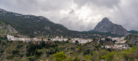 panorama view of the idyllic whitewashed Andalusian mountain village of Grazalema