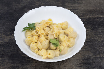 Boiled meat dumplings original shape on the white dish