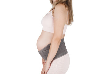 Pregnant woman belly in prenatal pregnancy maternity belt isolated on white background. Support waist, back, abdomen band. Belly Brace. Belly band for pregnancy. Orthopedic abdominal support belt.