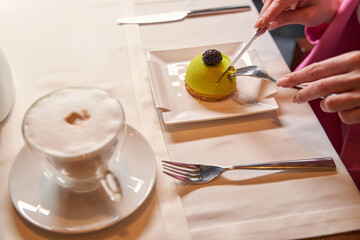 Sweet treat served on minimalistic white plate for customer delight