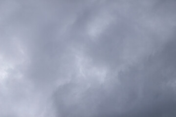 low angle view on dark cloudy sky, stormy weather