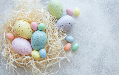 Fototapeta na wymiar Colorful Easter eggs on concrete background
