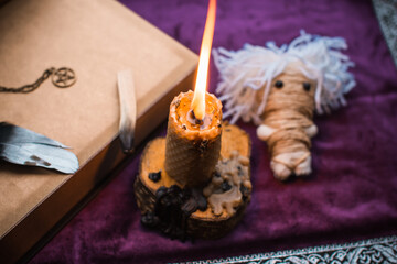 Concept of pagan magic, voodoo. Magical handmade doll .Witchcraft with a doll. 