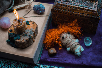 Concept of pagan magic, voodoo. Magical handmade doll .Witchcraft with a doll. 
