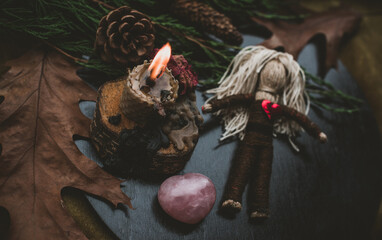 Concept of pagan magic, voodoo. Magical handmade doll .Witchcraft with a doll. 