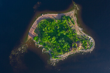 View from the height of the fort Emperor Paul 1 in Kronstadt, the Gulf of Finland, the island of forts, a ruined red brick building in the Gulf of Finland.