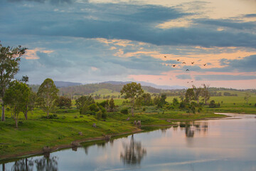 Fototapeta premium sunset over the lake