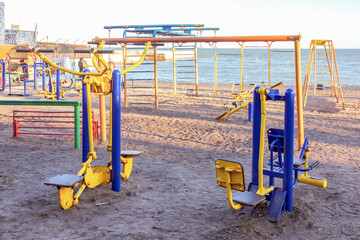 Mariupol, Ukraine, Sea of Azov, peacetime, sports equipment on the city beach on the sand, for training, the sea is visible in the distance