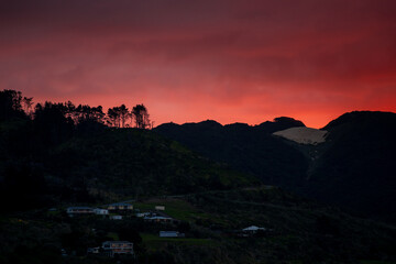 fiery red sunset over the mountains