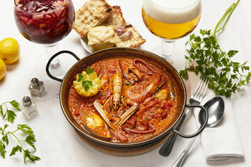 Paella on the table. Spanish typical food.