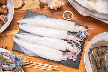 Fresh squid on wooden background,Fresg seafood Squid ready to cook.