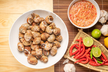 Seafood dish, steamed  areola babylon or spotted babylon , served with Thai spicy and sour seafood...