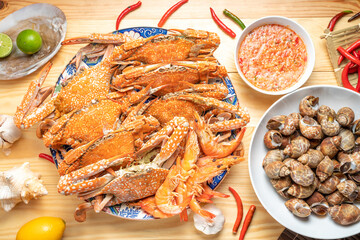 Seafood dish, steamed and cooked blue crab and areola babylon or spotted babylon , served with Thai...