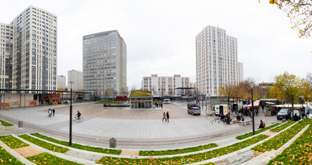 Obraz premium Paris, France - November 14th 2021: Panorama of Place des Fetes with surrounding buildings