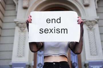 Female right activists protests in front of the courthouse against sexism.