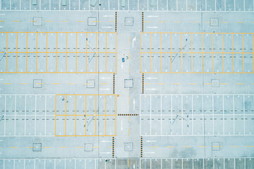 Aerial top down shot of an empty car parking lot