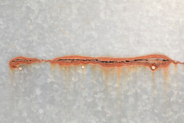 Oxidized rusty white iron scale