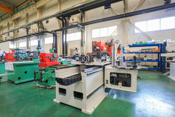 workers work hard on the production line of a welding equipment Co., Ltd., North China