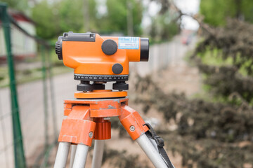 Theodolite tool is a construction measuring instrument in an industrial area or on a construction site survey equipment
