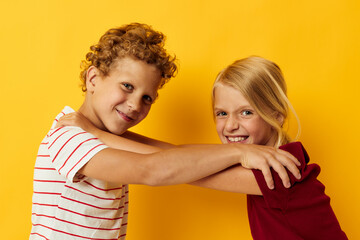 Portrait of cute children casual wear games fun together isolated background