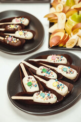 white key pops, decorated with multi colored beads