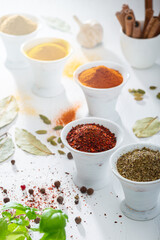 Wooden table of colorful spices. Light.background.