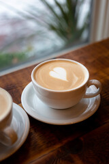 Latte Closeup on Wood Table