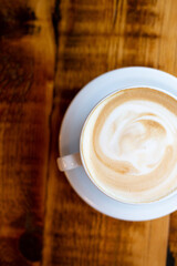 Latte Closeup on Wood Table