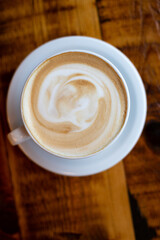 Latte Closeup on Wood Table