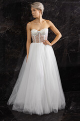 Fototapeta premium beautiful caucasian woman in a wedding dress 