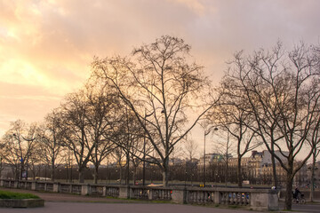 Street in Paris at sunset, France