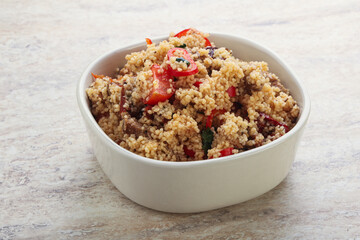 Arabic cous cous with meat and tomato