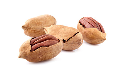 Pecan nuts in closeup isolated on white background.