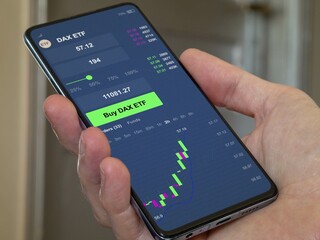 Stock europe dax exchange market chart, german blue chips market data on smartphone. Business analysis of a trend. Invest in european traded fund. Buying strategic DAX ETF