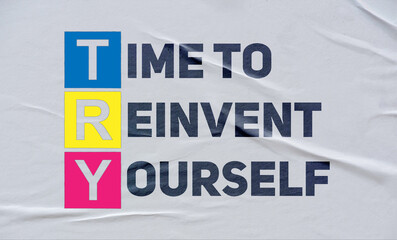 time to reinvent yourself, (TRY), written on white paper