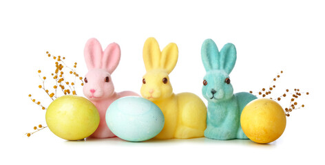 Beautiful Easter bunnies, flowers and painted eggs on white background