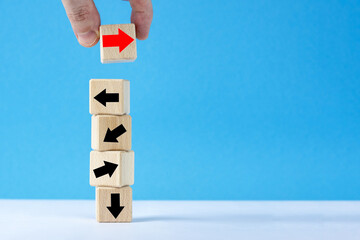  Hand. Wooden cubes with arrows.