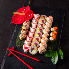 tasty sushi on the black stone