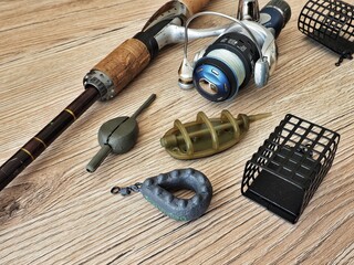 Fishing tackle set on wooden desk